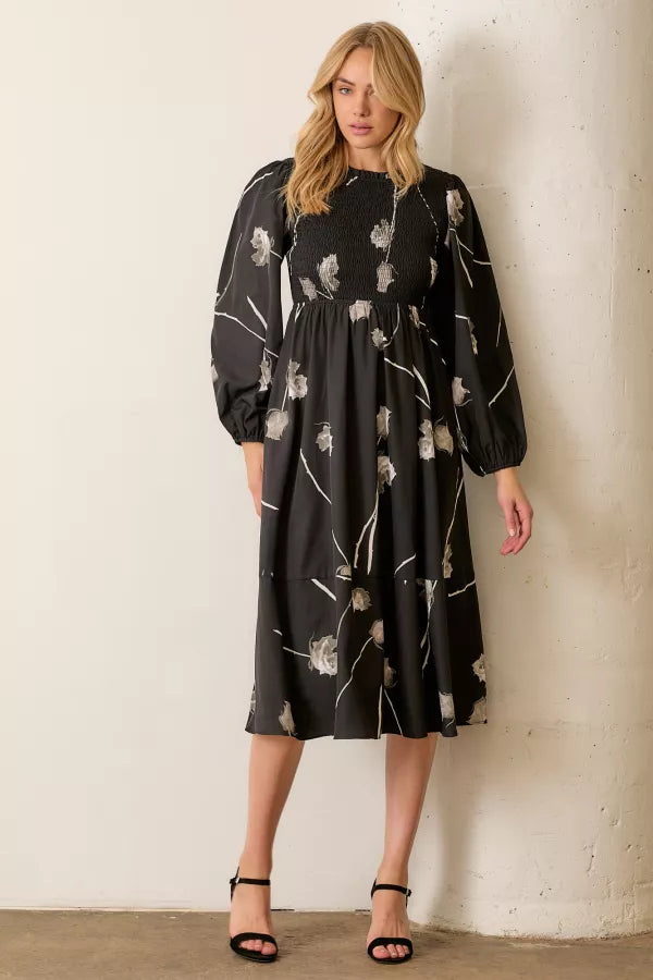 The Bree Floral Smocked Midi Dress in Black