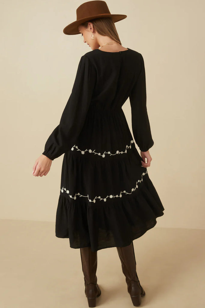 The Alena Embroidered Tiered Midi Dress in Black