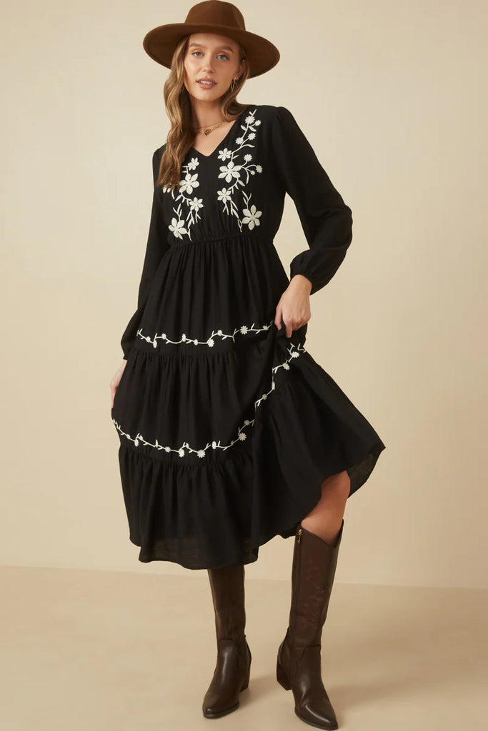 The Alena Embroidered Tiered Midi Dress in Black