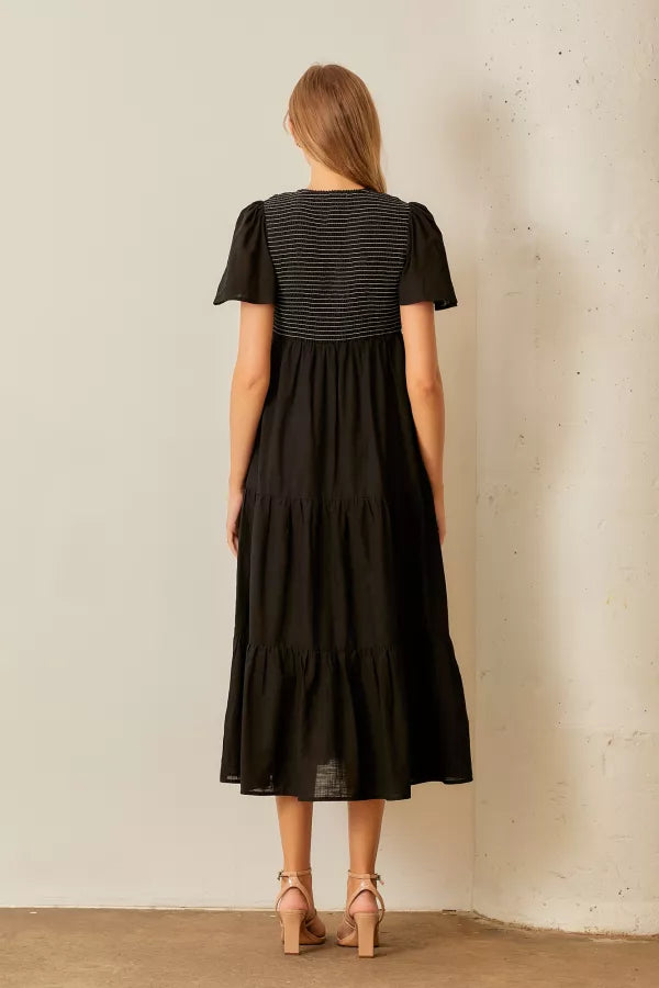 The Lisa Smocked V-Neck Midi Dress in Black